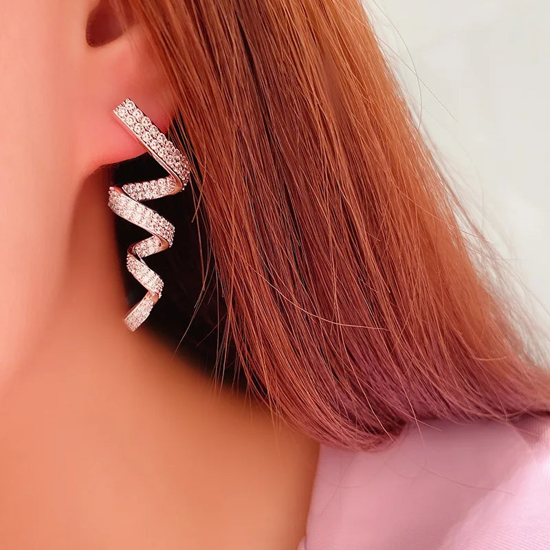 Rotational Ribbon Shaped Drop Earrings